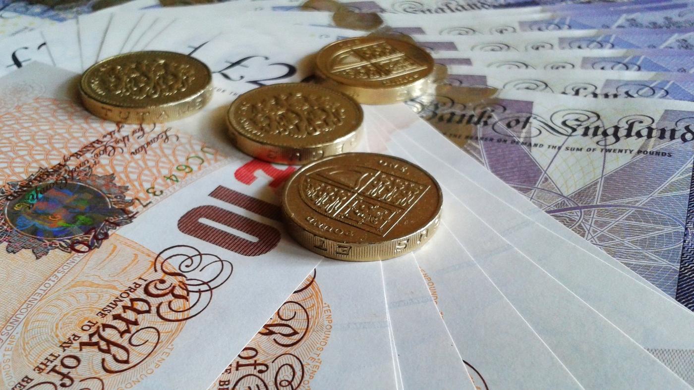 Pound coins and notes