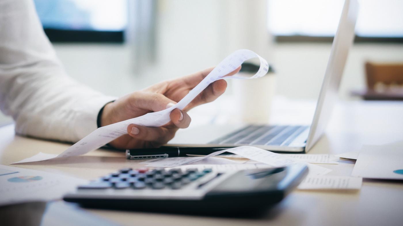 Calculator and paperwork