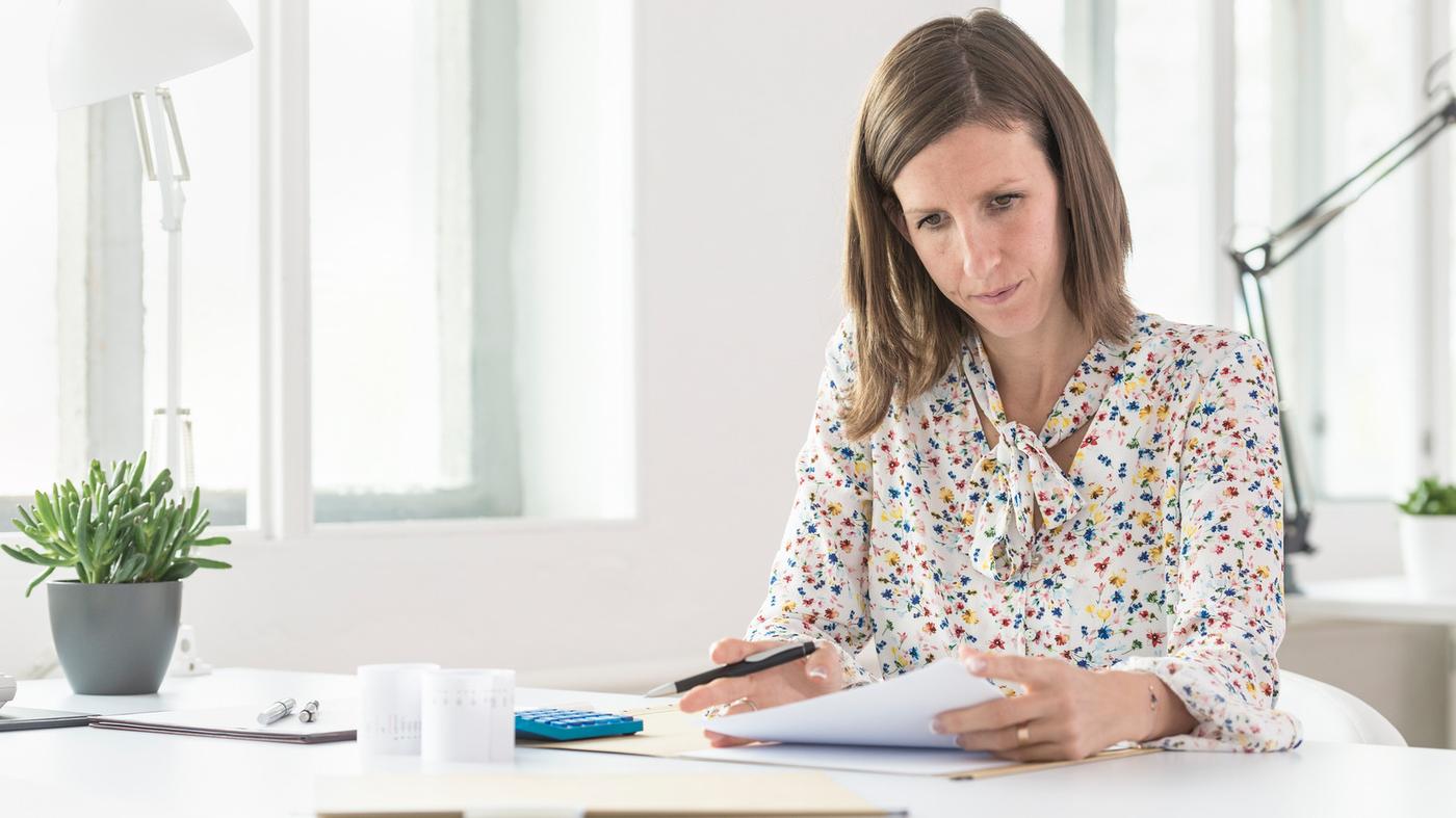 Women working with documents