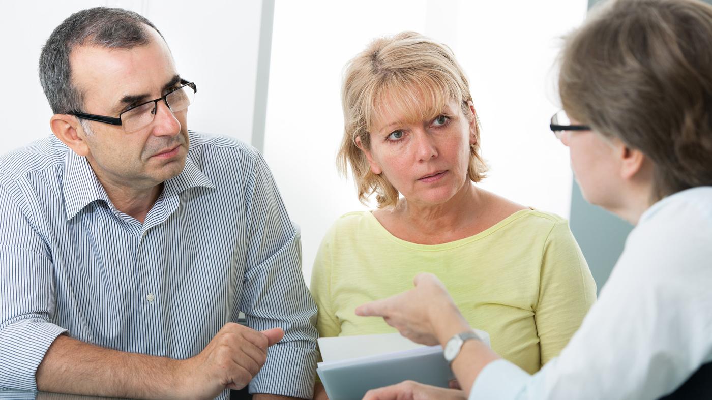 Man and women meeting advisor