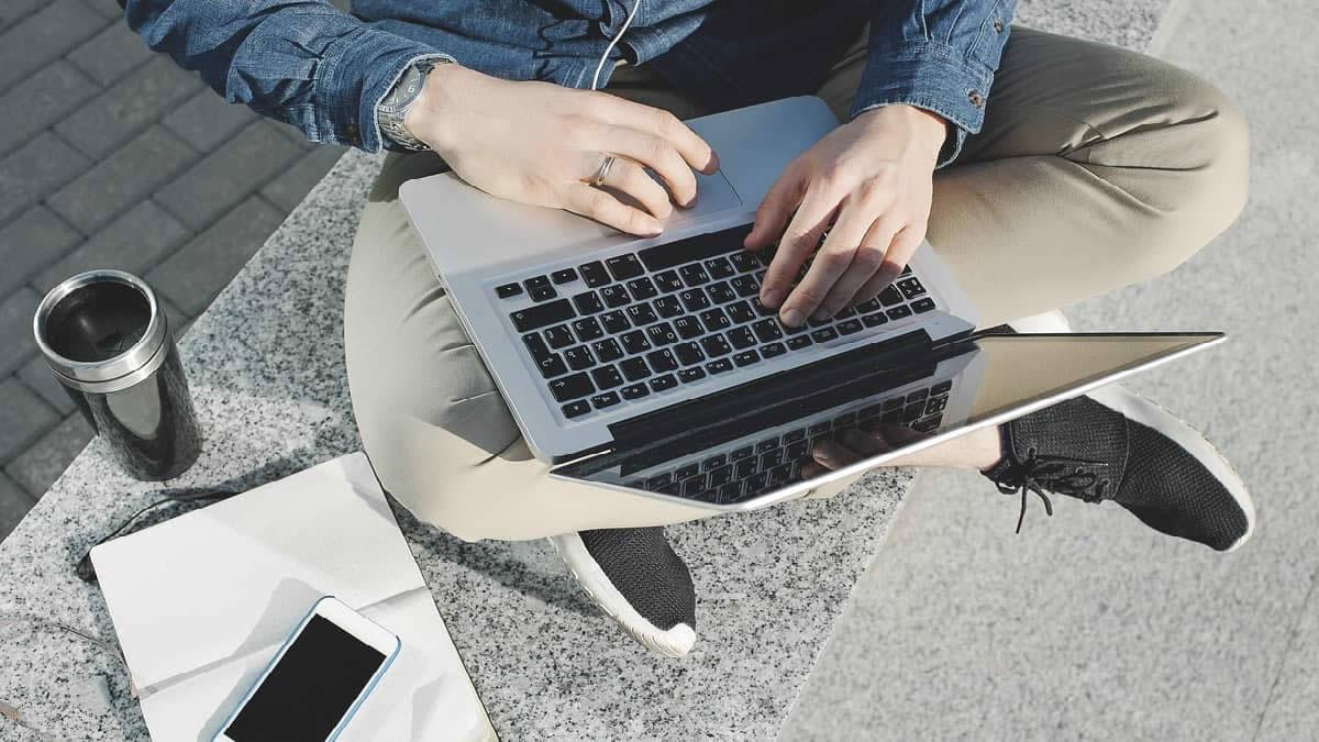 Working on laptop outside