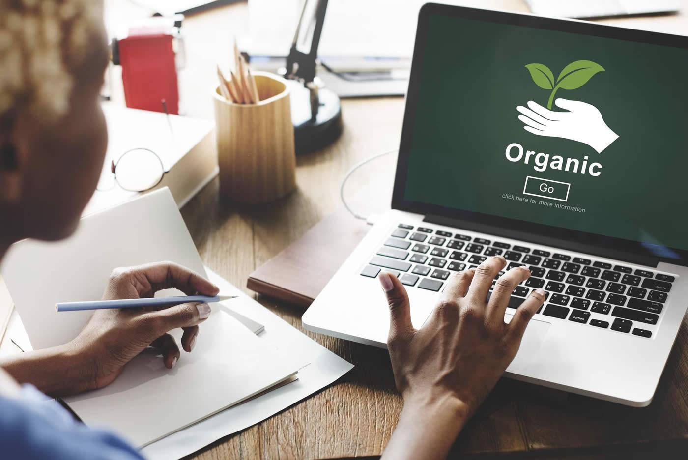 Laptop screen with 'organic' written