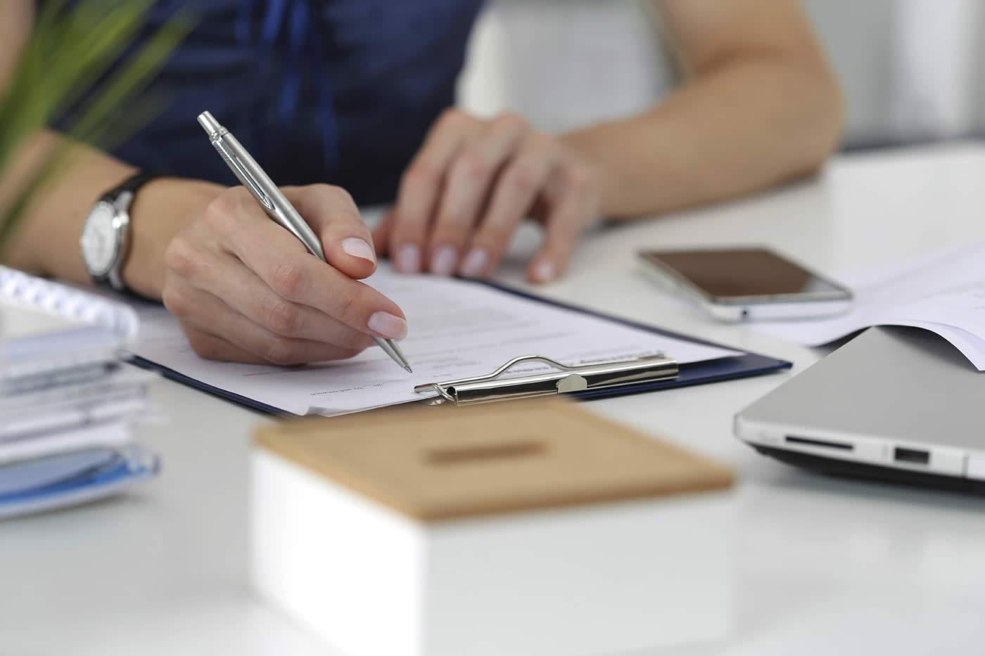 Man signing a contract