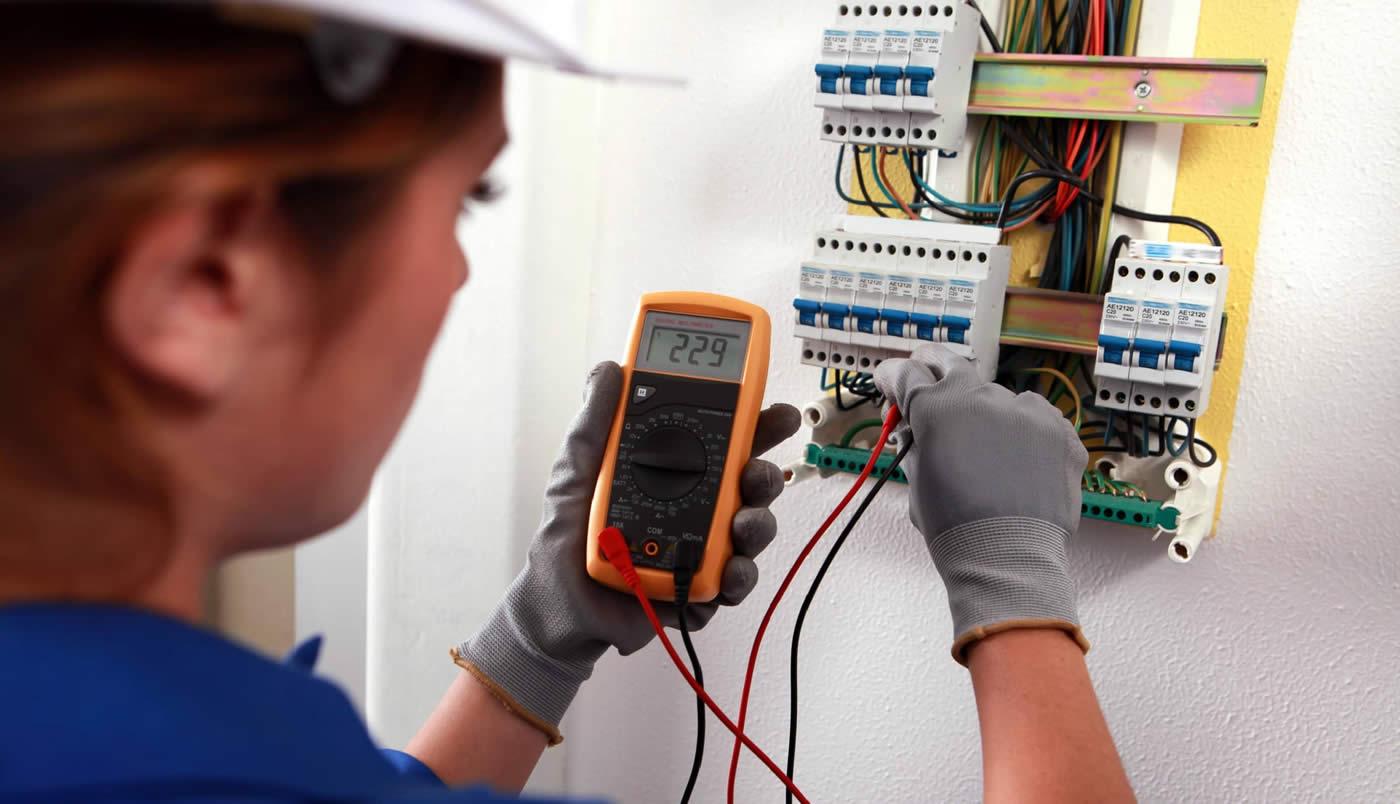 Electrician fixing fuse box