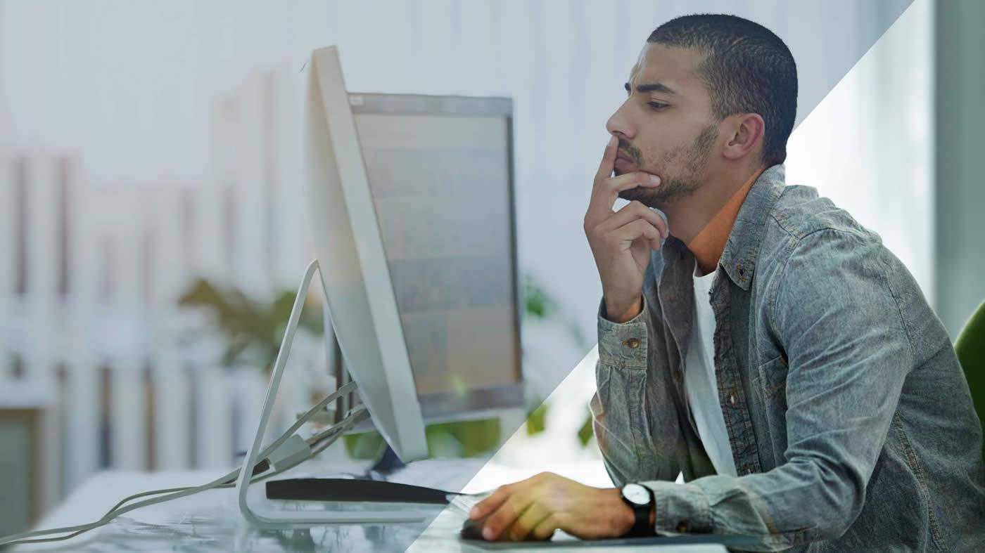 Man studying iMac screen