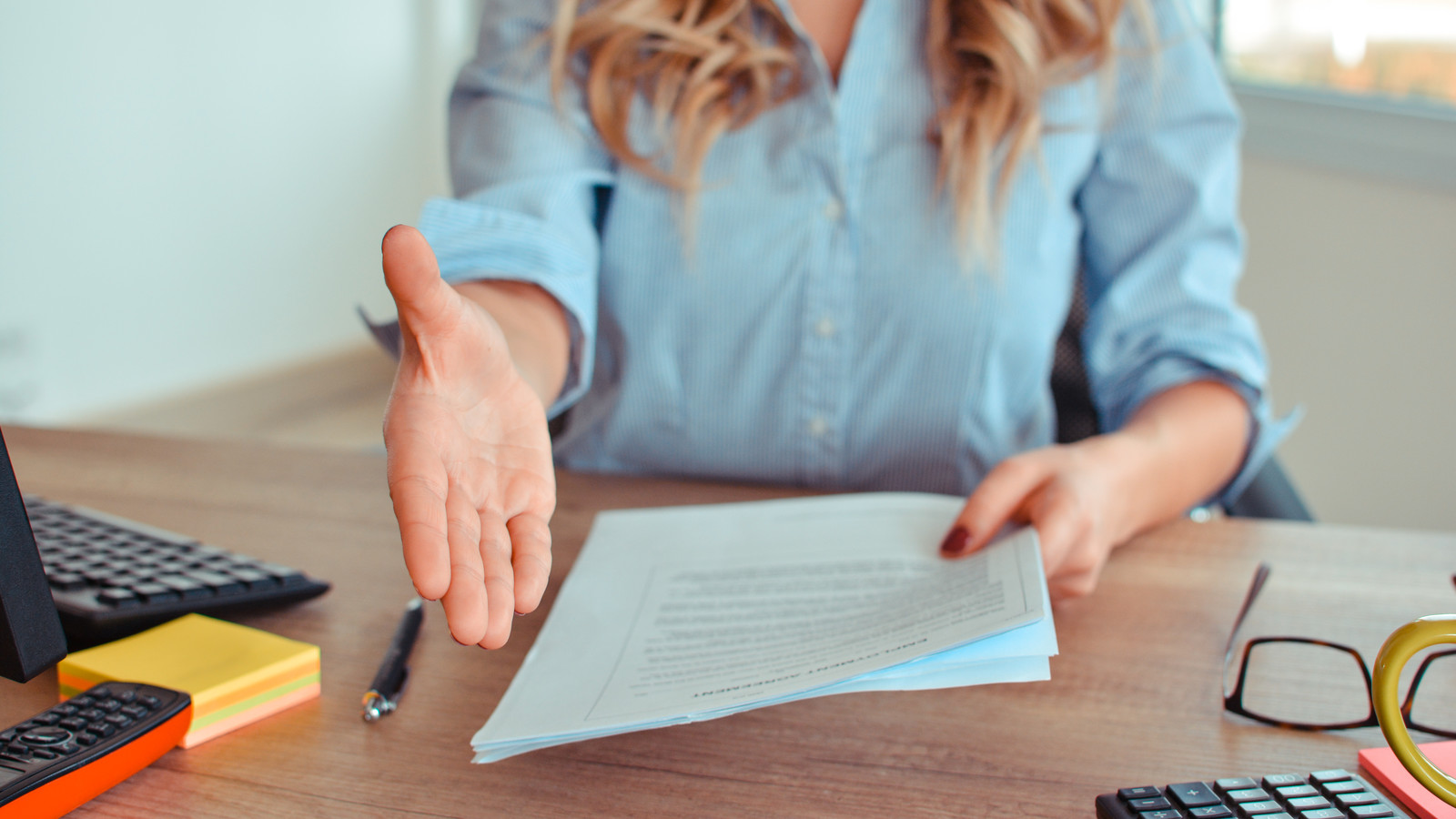 Woman offer Handshake to seal a deal after a job recruitment meeting